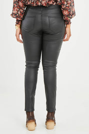 Model Noli wearing size 14 of the Hot Stuff Coated Jean in colour Black (Black), from the back