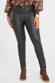 Model Noli wearing size 14 of the Hot Stuff Coated Jean in colour Black (Black), from the front, cropped image