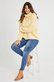 Model Laura wearing size 14 of the Wild Plains Flat Front Stitch Jeggings in colour Denim (Blue), from the front, showing the whole outfit