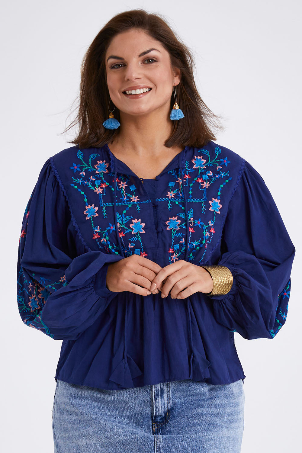 Model Monique wearing size 14 of the My Happiness Embroidered Blouse in colour Navycombo (Blue), from the front, cropped image