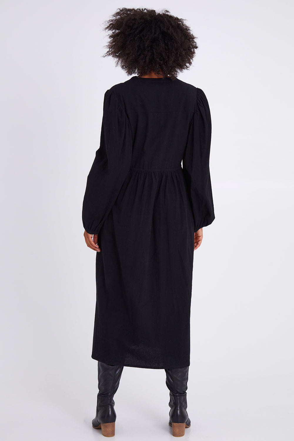 Model Olivia wearing size 10 of the For Love And Dancing Dress in colour Black (Black), from the back