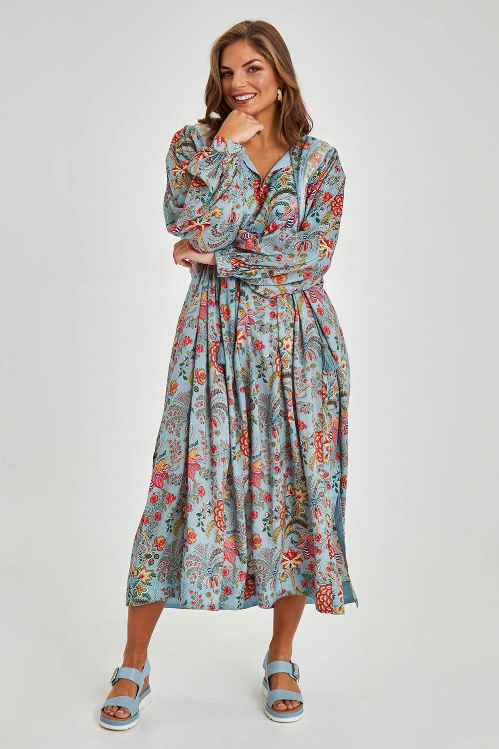 Model Monique wearing size 14 of the Now And Forever Dress in colour Icefleur (Blue), from the front, showing the whole outfit