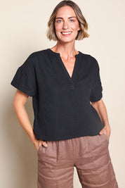 Model Riinar wearing size 10 of the Every Other Day Cotton Blouse – Black in colour Black, in a cropped view