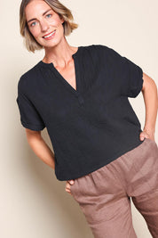 Model Riinar wearing size 10 of the Every Other Day Cotton Blouse – Black in colour Black, in a cropped view