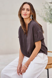 Model Tegand wearing size 10 of the Every Other Day Cotton Blouse – Chocolate in colour Chocolate, in a cropped view
