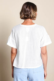 Model Riinar wearing size 10 of the Every Other Day Cotton Blouse – White in colour White, from the back