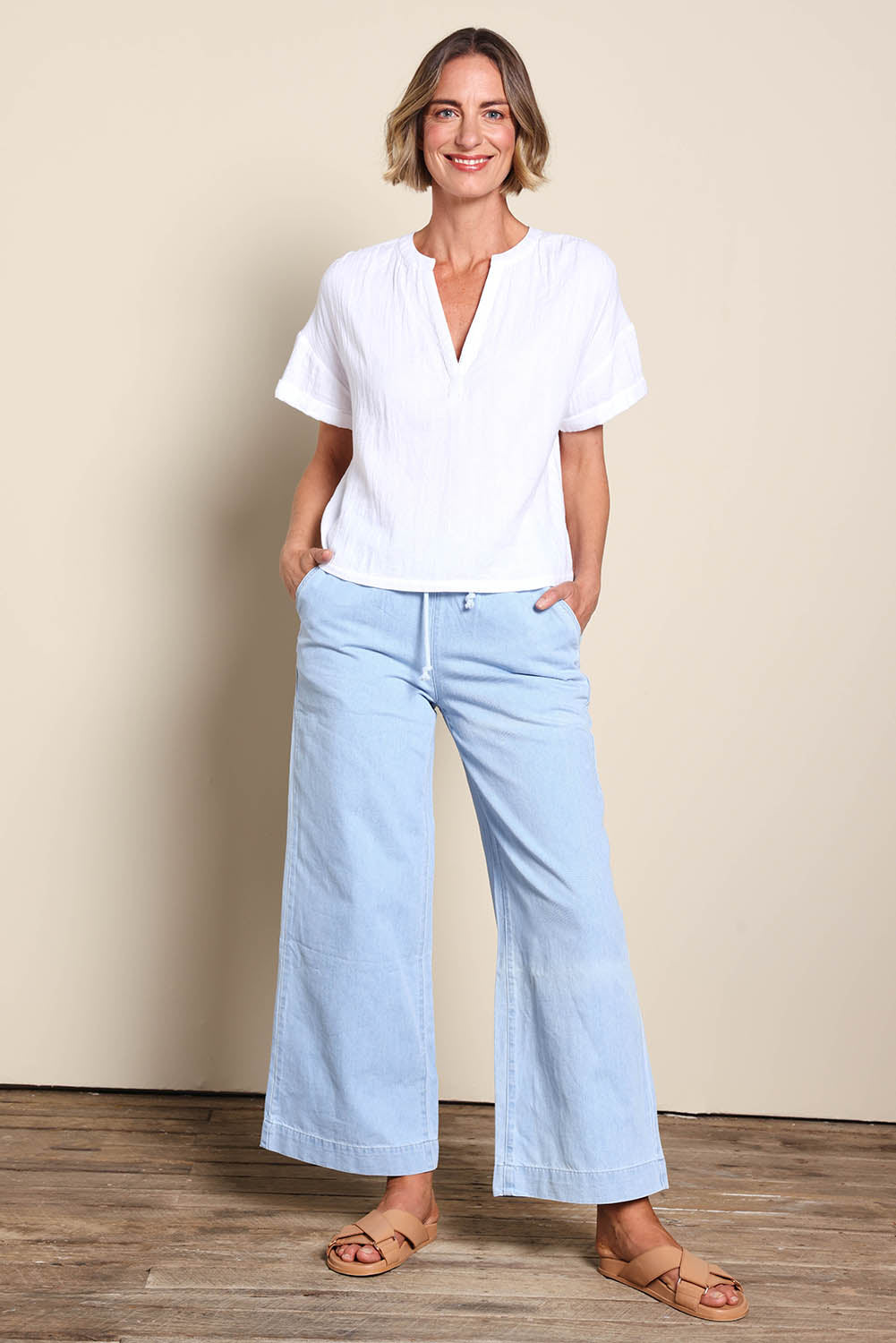 Model Riinar wearing size 10 of the Every Other Day Cotton Blouse – White in colour White, from the front