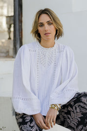 Model Tegan wearing size 10 of the My Fair Lady Blouse in colour White (White), from the front, showing the whole outfit