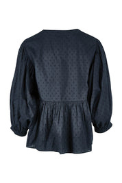 Product shot of the Happy Hour Dobby Blouse in colour Black (Black), from the back
