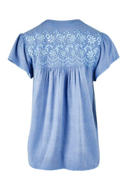 Product shot of the Floral Fields Embroidered Top in colour Chambray (Blue), from the back