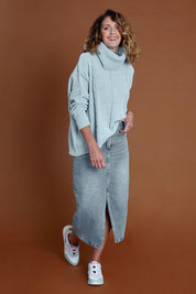 Model Emma wearing size S of the Hold Me In Your Arms Chenille Sweater in colour Iceblue (Blue), from the front, showing the whole outfit