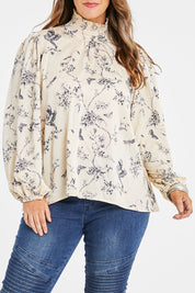 Model Laura wearing size 14 of the Teatime And Flowers Blouse in colour Cream (White), from the front, cropped image