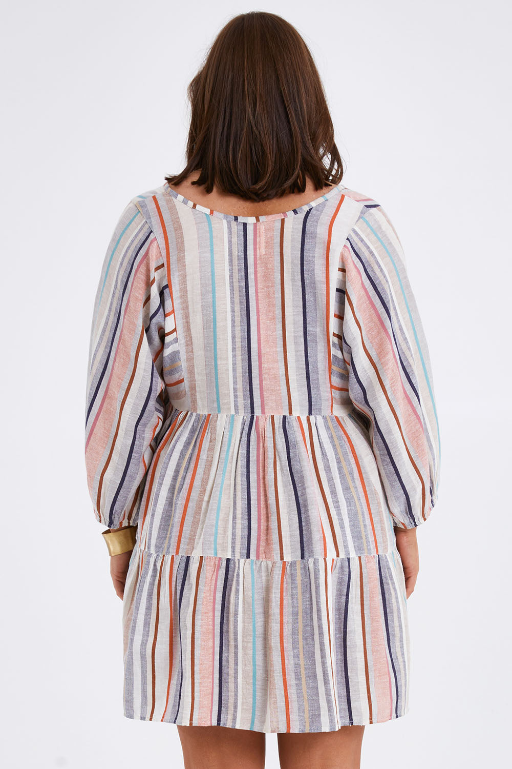 Model Monique wearing size 14 of the Easy Day Yarn Dyed Cotton Dress in colour Stripe (White), from the back