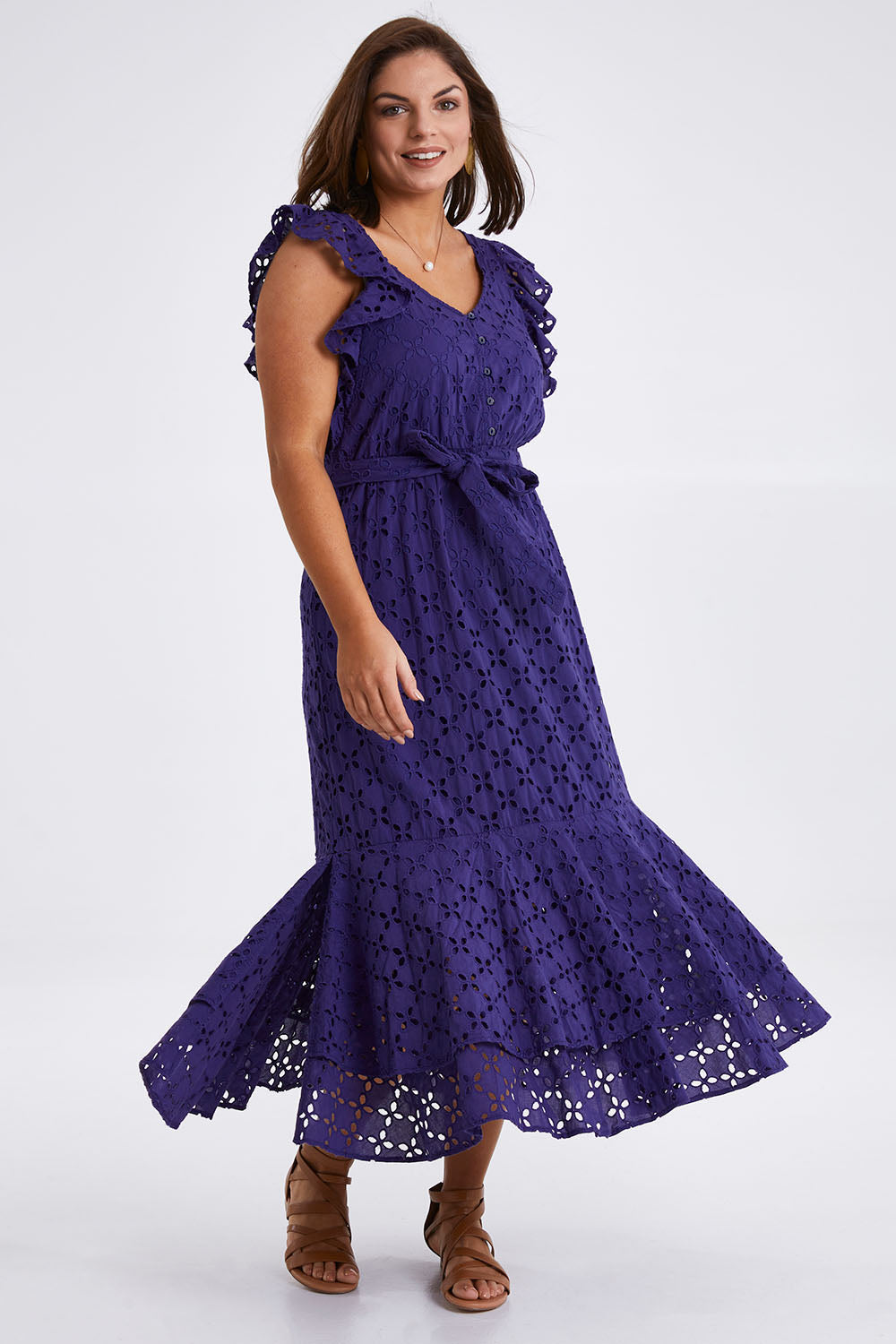 Model Monique wearing size 14 of the Beauty In Broderie Dress in colour Navy (Blue), from the front, showing the whole outfit
