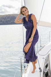 Model Tegan wearing size 10 of the Beauty In Broderie Dress in colour Navy (Blue), from the front, showing the whole outfit