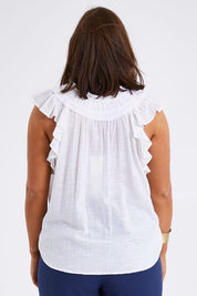 Model Monique wearing size 14 of the Summer Sun Ruffle Blouse in colour White (White), from the back
