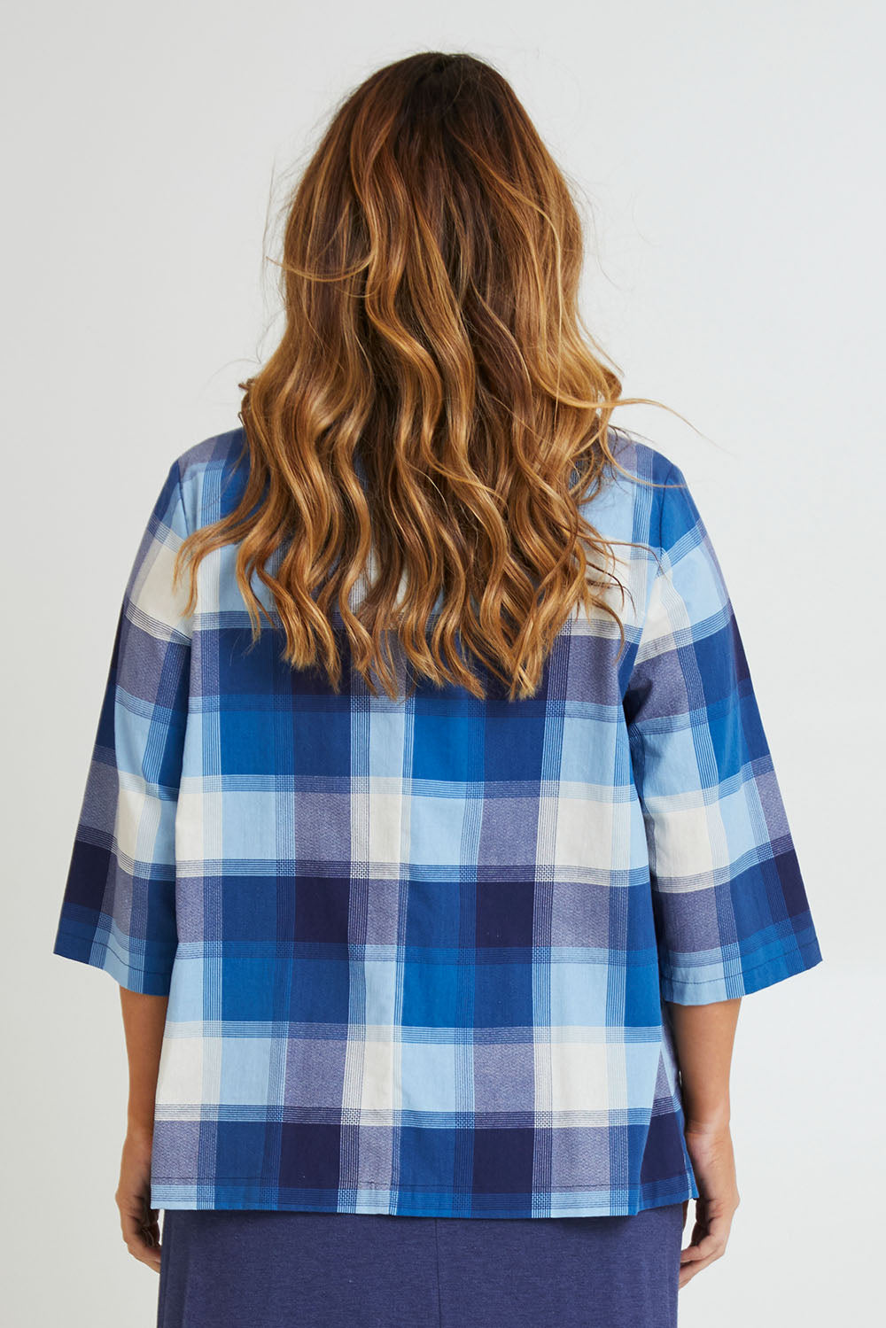 Model Laura wearing size 14 of the Missing You Dearly Blazer in colour Bluecheck (Blue), from the back