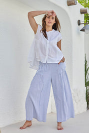 Model Tegand wearing size 10 of the Break Of Day Cotton Pants - Bluestripe in colour Bluestripe, from the front