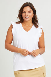 Model Monique wearing size 14 of the For The Frill Of It Tee in colour White (White), from the front, cropped image