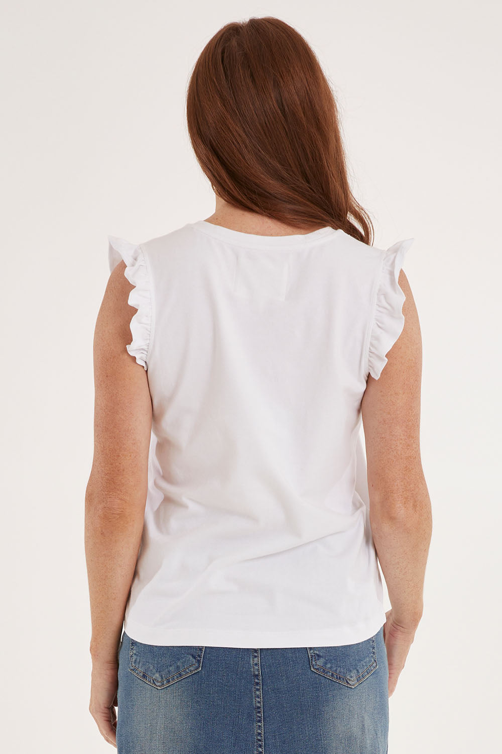Model Sally wearing size 10 of the For The Frill Of It Tee in colour White (White), from the back
