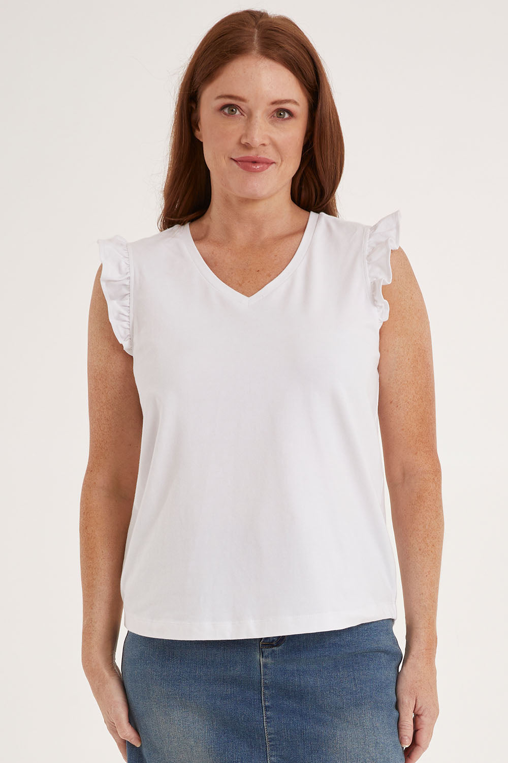 Model Sally wearing size 10 of the For The Frill Of It Tee in colour White (White), from the front, cropped image