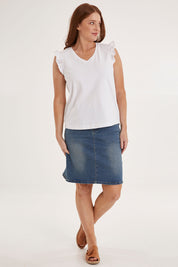 Model Sally wearing size 10 of the For The Frill Of It Tee in colour White (White), from the front, showing the whole outfit