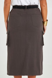 Model Monique wearing size 14 of the Carry Me With You Cargo Skirt in colour Concrete (Grey), from the back