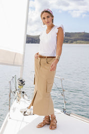 Model Tegan wearing size 10 of the Carry Me With You Cargo Skirt in colour Sand, from the front, showing the whole outfit