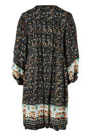 Product shot of the Sunset Dreamer Dress in colour Blkfleur (Black), from the back