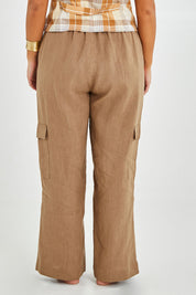 Model Monique wearing size 14 of the Always In Style Linen Cargo Pant in colour Camel, from the back