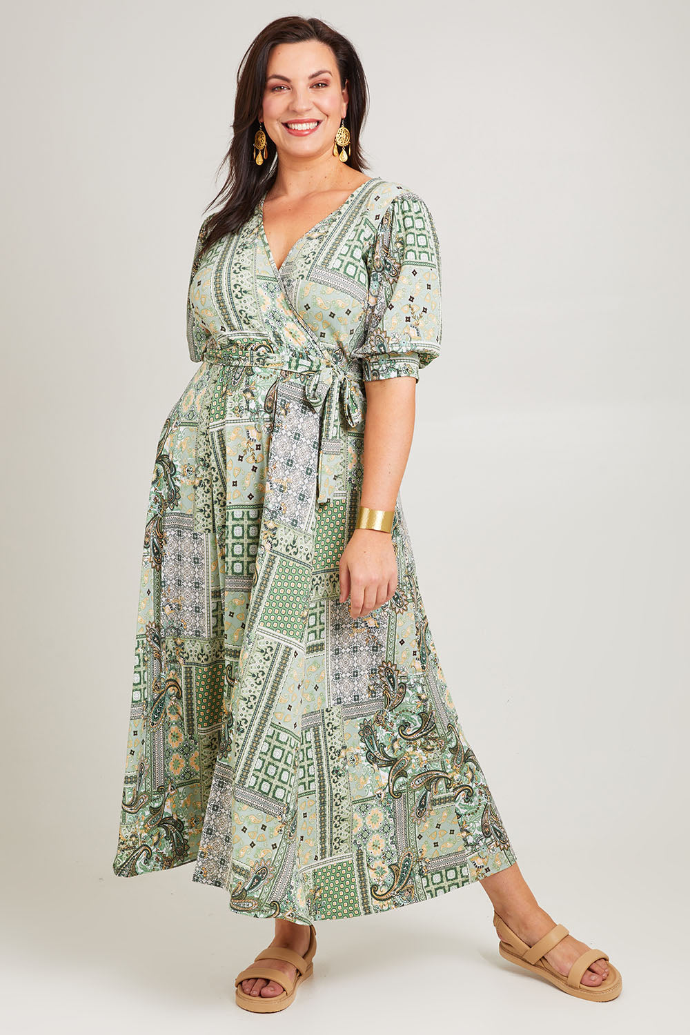 Model Poppy wearing size 16 of the All I Need Is You Mid Sleeve Dress in colour Mintpatch (Green), from the front, showing the whole outfit
