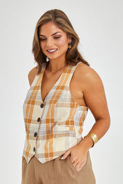 Model Monique wearing size 14 of the Ready And Able Checked Vest in colour Check, from the front, cropped image