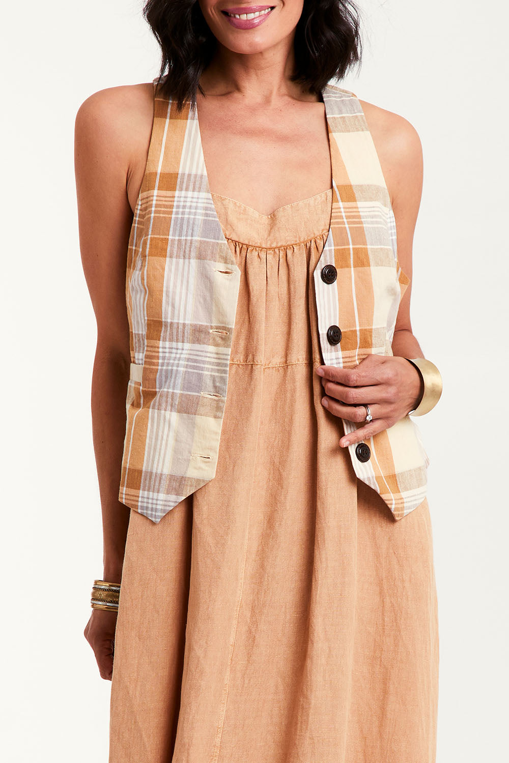 Model Natalie wearing size 10 of the Ready And Able Checked Vest in colour Check, from the front, cropped image