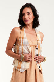 Model Natalie wearing size 10 of the Ready And Able Checked Vest in colour Check, from the front, cropped image