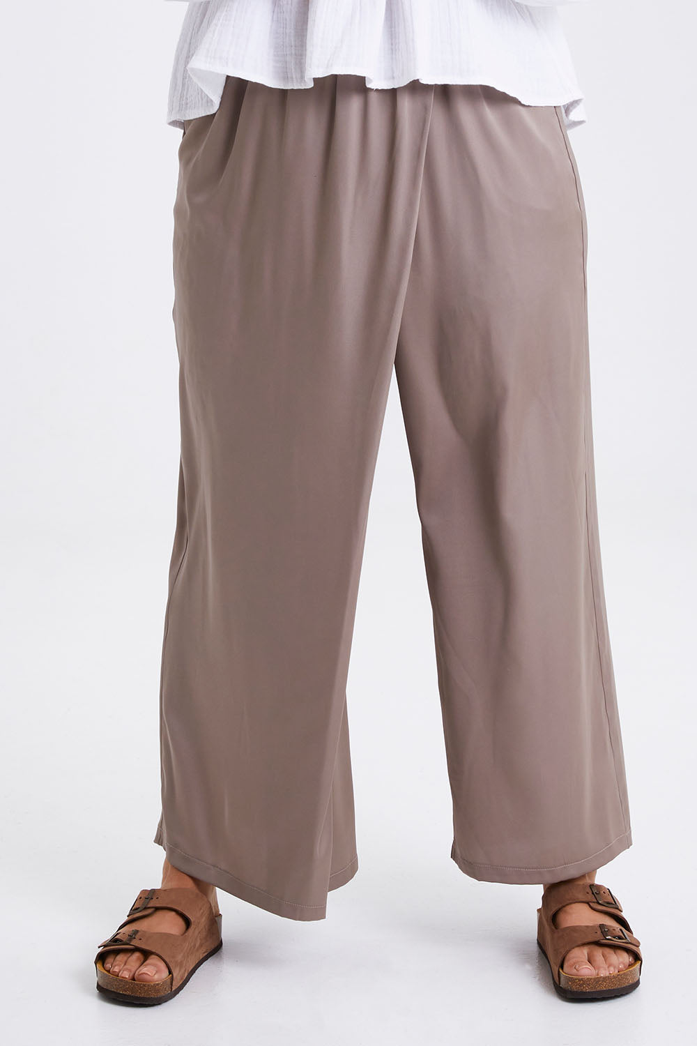 Model Monique wearing size 14 of the Going With The Flow Overlay Pants in colour Bungee, from the front, cropped image