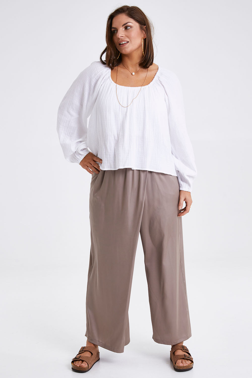 Model Monique wearing size 14 of the Going With The Flow Overlay Pants in colour Bungee, from the front, showing the whole outfit