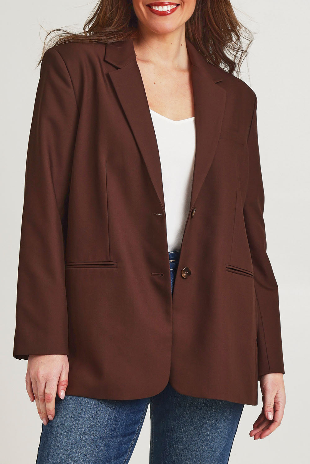 Model Jane wearing size 14 of the Elegant Persuasion Oversized Blazer in colour Chocolate, from the front, cropped image
