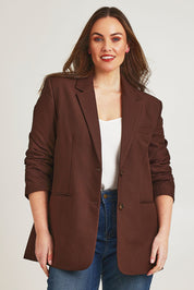 Model Jane wearing size 14 of the Elegant Persuasion Oversized Blazer in colour Chocolate, from the front, cropped image