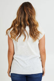 Model Laura wearing size L of the Go To Knit Tank in colour White (White), from the back