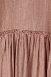 Product shot of the Real Love Tiered Dress in colour Umber, detail