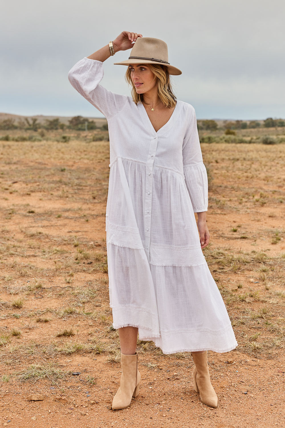 Model Tegan wearing size 10 of the Real Love Tiered Dress in colour White (White), from the front, showing the whole outfit