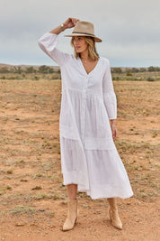 Model Tegan wearing size 10 of the Real Love Tiered Dress in colour White (White), from the front, showing the whole outfit