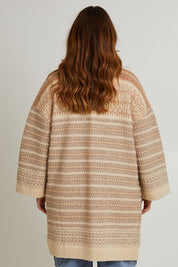 Model Laura wearing size L of the Mountain Dreaming Oversized Cardi in colour Naturals, from the back
