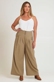 Model Chanel wearing size 16 of the High Flying Wide Leg Pants in colour Pumice, from the front, showing the whole outfit