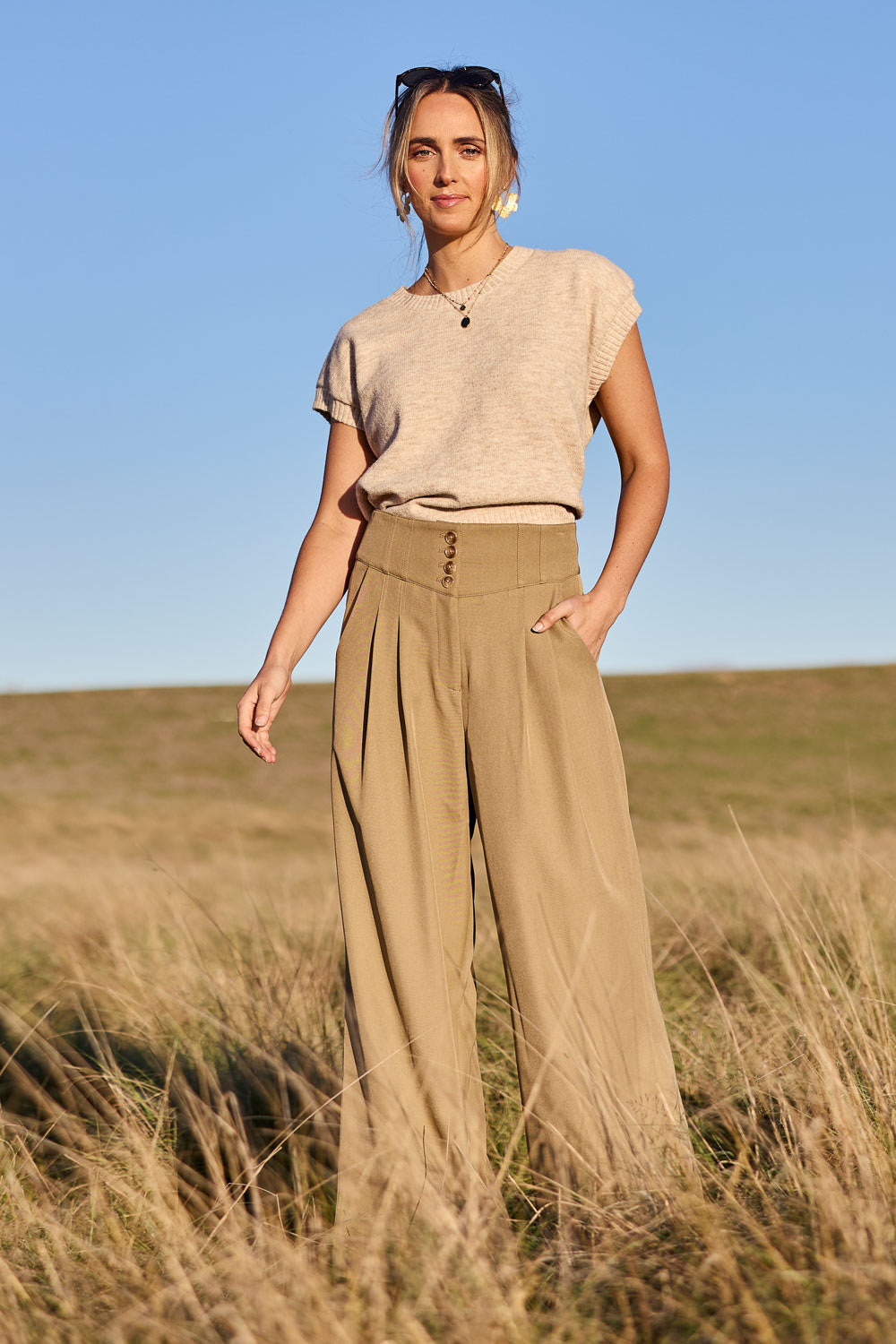 Model Tegan wearing size 10 of the High Flying Wide Leg Pants in colour Pumice, from the front, showing the whole outfit