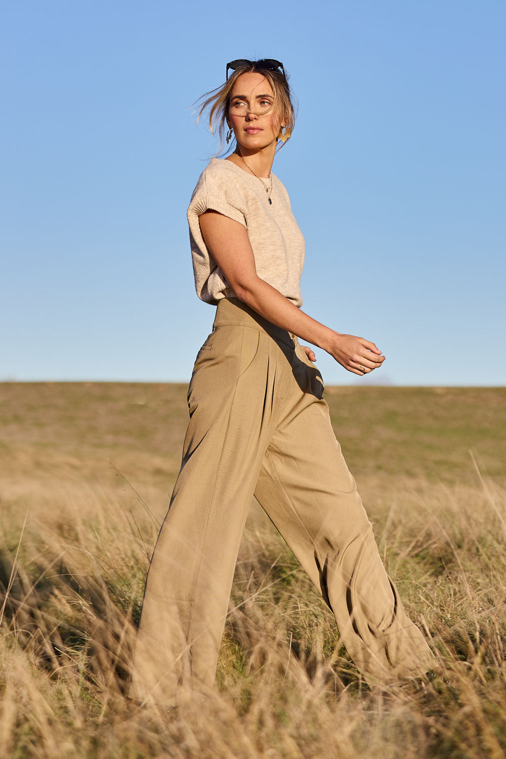 Model Tegan wearing size 10 of the High Flying Wide Leg Pants in colour Pumice, from the front, showing the whole outfit