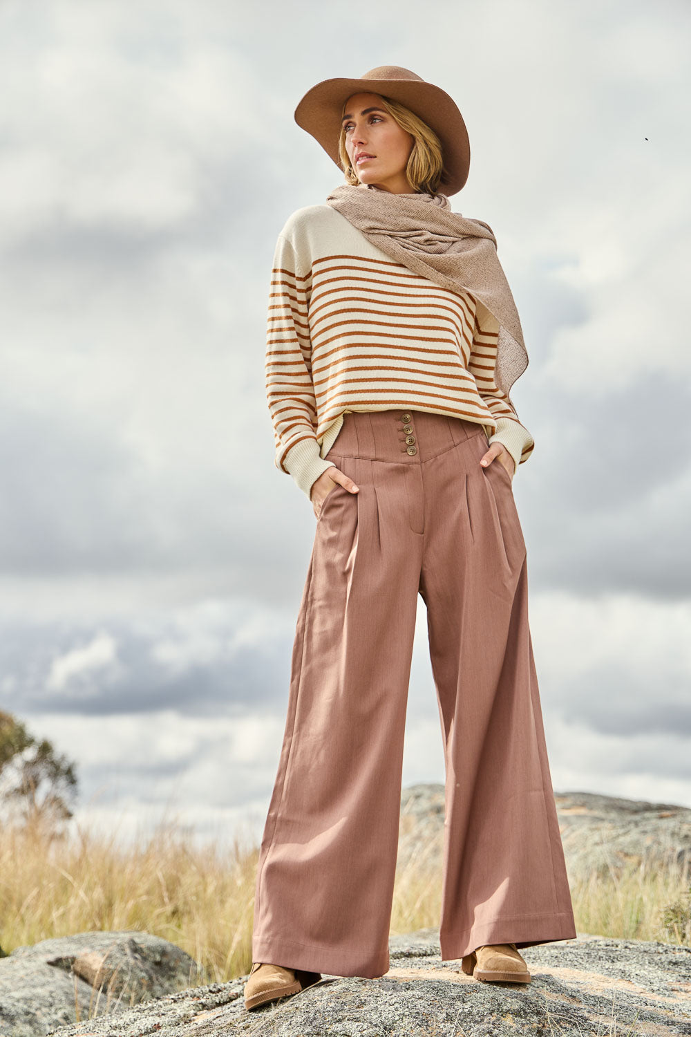 Model Tegan wearing size 10 of the High Flying Wide Leg Pants in colour Walnut, from the front, showing the whole outfit
