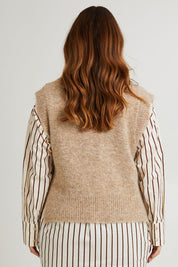 Model Laura wearing size L of the Lovely Day Vest in colour Natural, from the back
