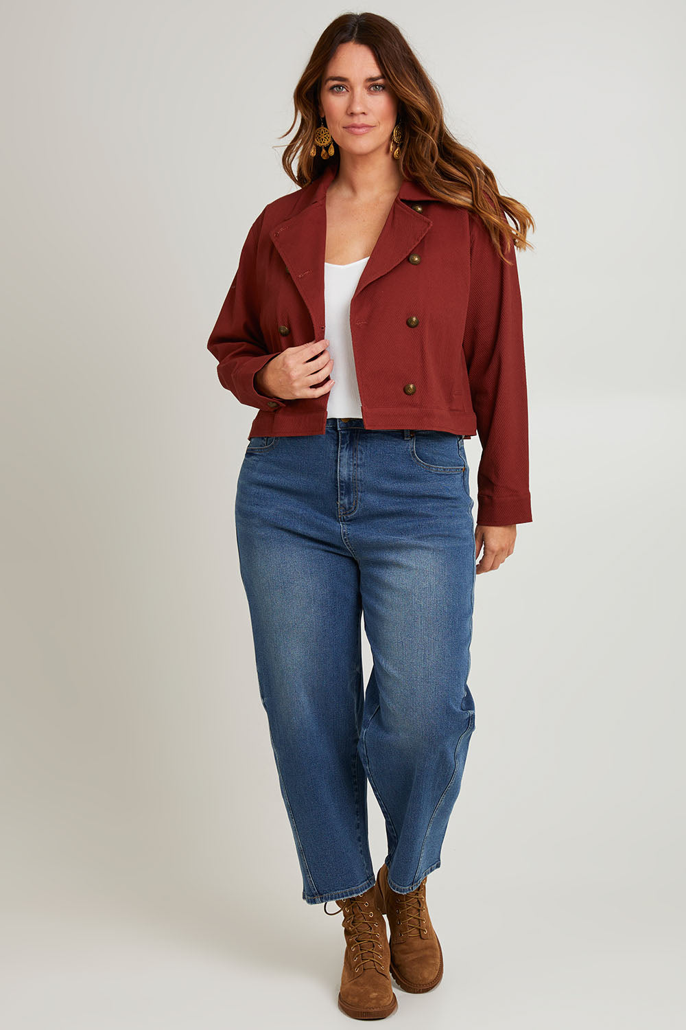 Model Laura wearing size 14 of the Coffee Date Jacket in colour Rust (Red), from the front, showing the whole outfit