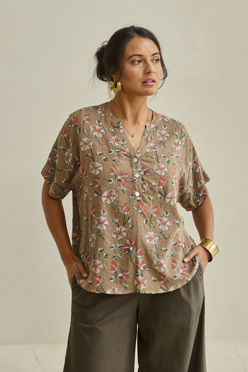 Model Tahnee wearing size 10 of the Flower Chain Slouch Top in colour Fleur, from the front, showing the whole outfit